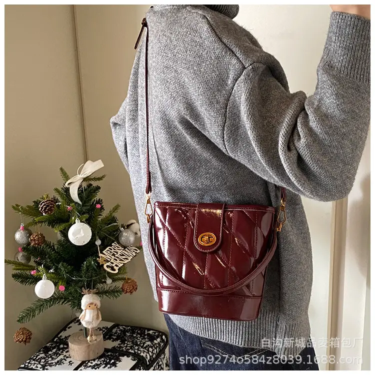 2026 Winter Quilted Black Bucket Bag with Gold Logo — feature 15