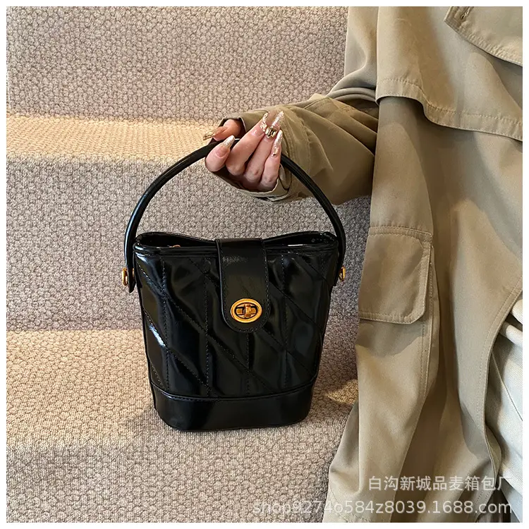 2026 Winter Quilted Black Bucket Bag with Gold Logo — feature 16