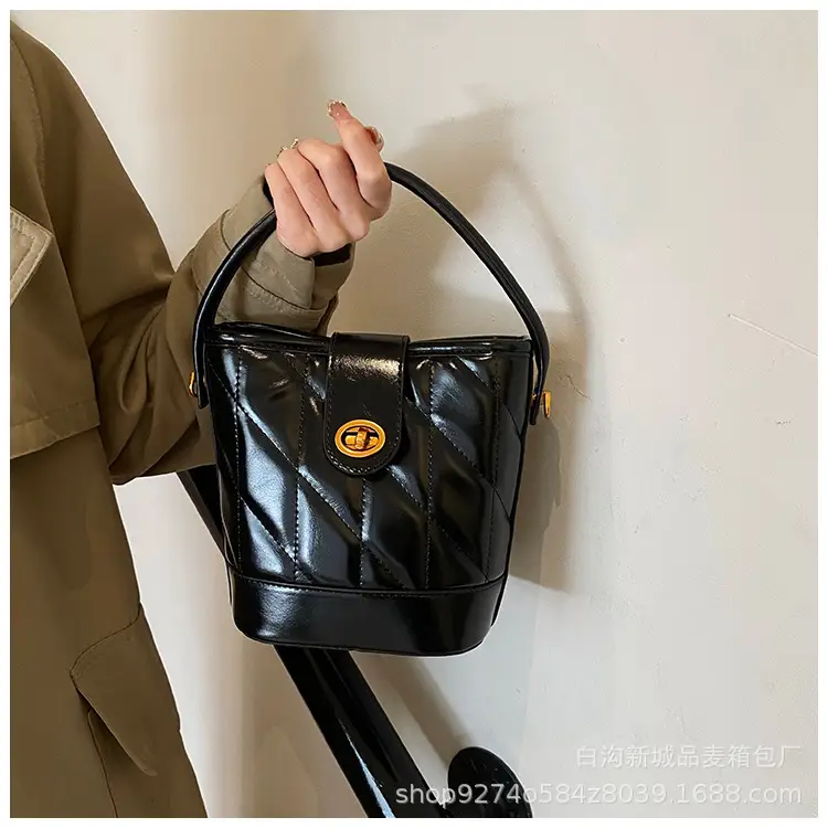 2026 Winter Quilted Black Bucket Bag with Gold Logo — feature 17