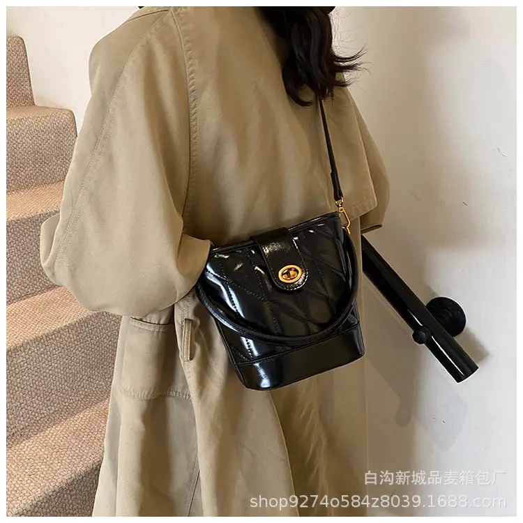 2026 Winter Quilted Black Bucket Bag with Gold Logo — feature 19