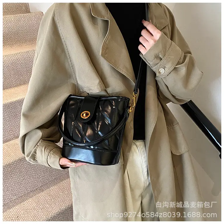 2026 Winter Quilted Black Bucket Bag with Gold Logo — feature 20