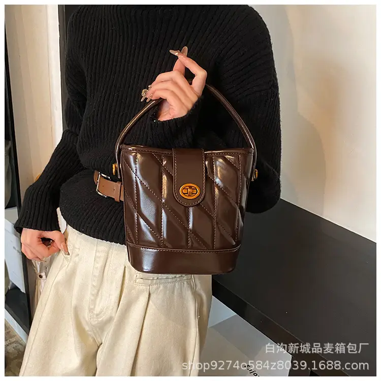 2026 Winter Quilted Black Bucket Bag with Gold Logo — feature 21