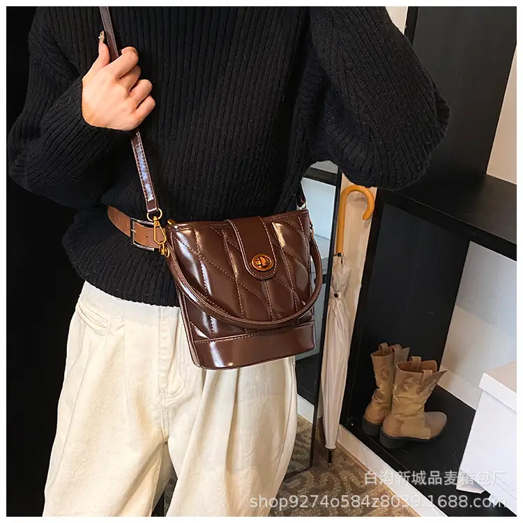 2026 Winter Quilted Black Bucket Bag with Gold Logo — feature 23