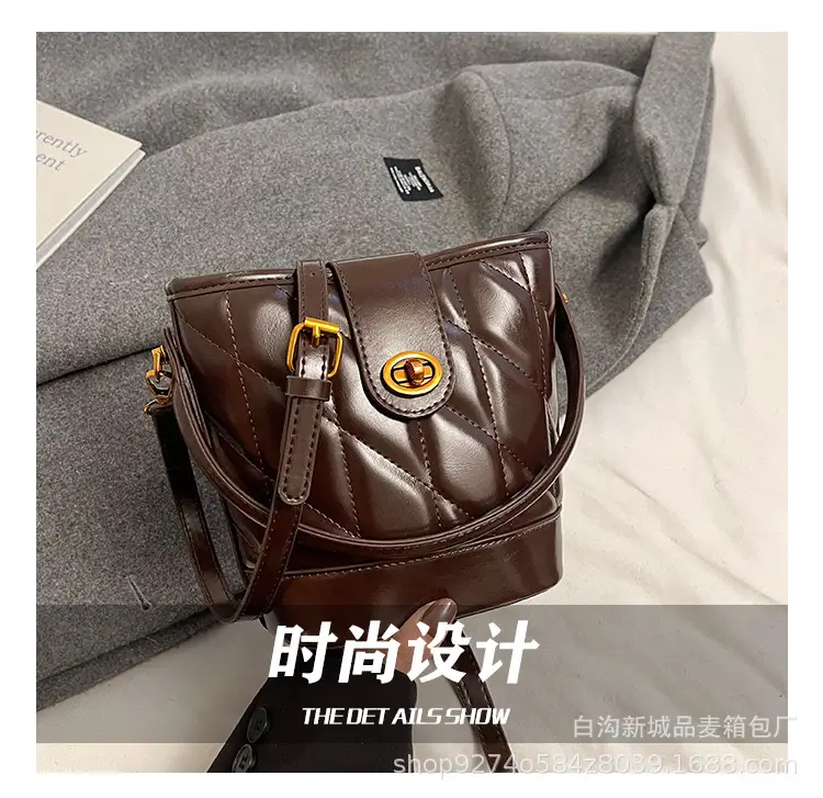 2026 Winter Quilted Black Bucket Bag with Gold Logo — feature 9