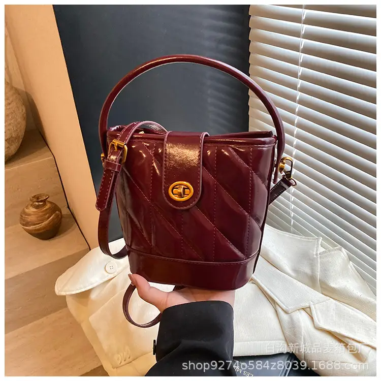 2026 Winter Quilted Black Bucket Bag with Gold Logo - Image 3