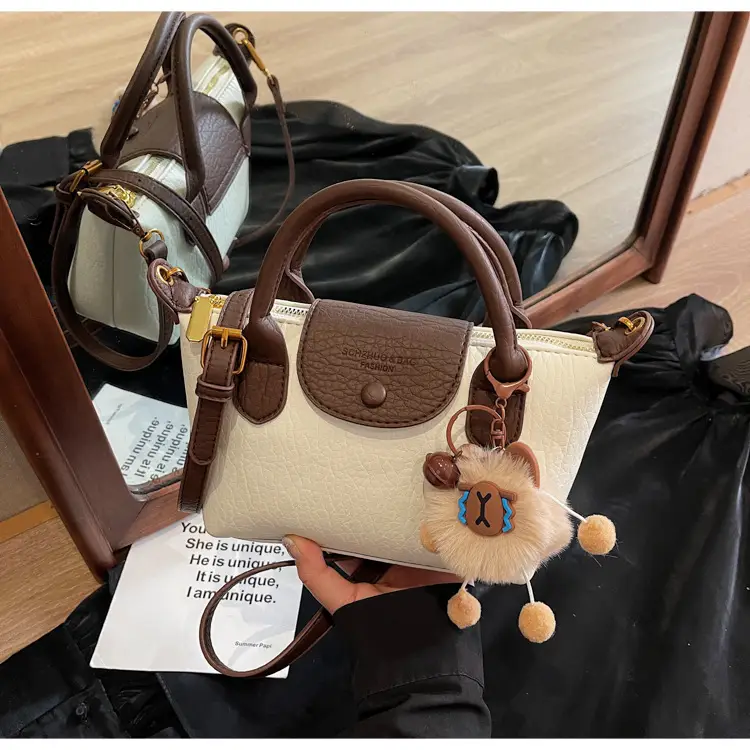 Brown Crossbody Bag with Faux Fur Pom Pom Charm — feature 40