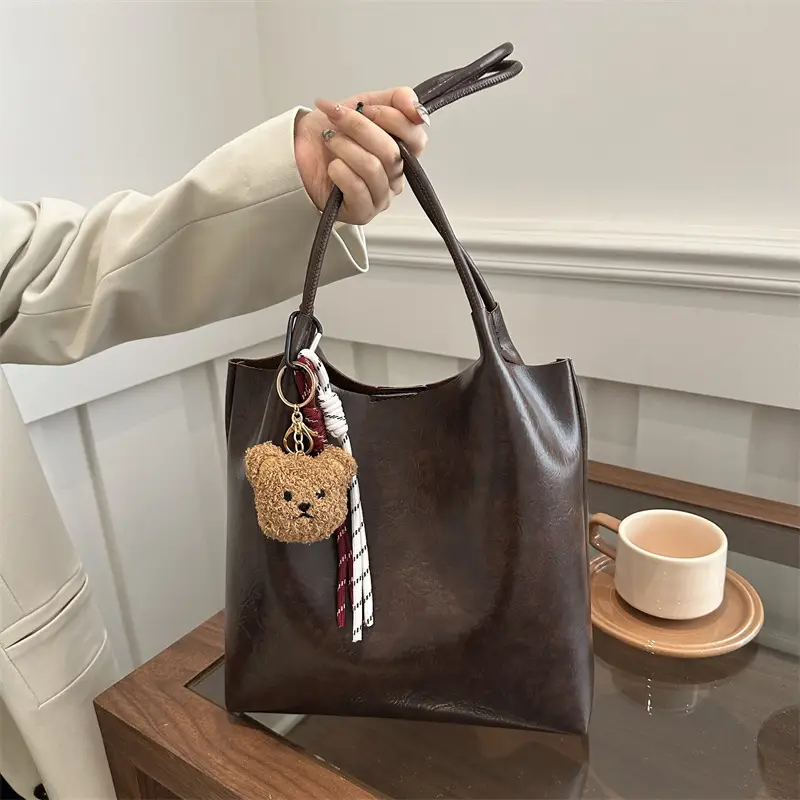 Women's Brown Leather Shoulder Bag with Teddy Bear Charm - Image 8