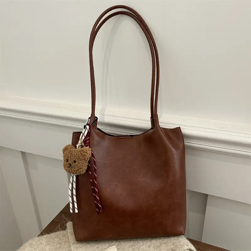 Women's Brown Leather Shoulder Bag with Teddy Bear Charm — feature 12
