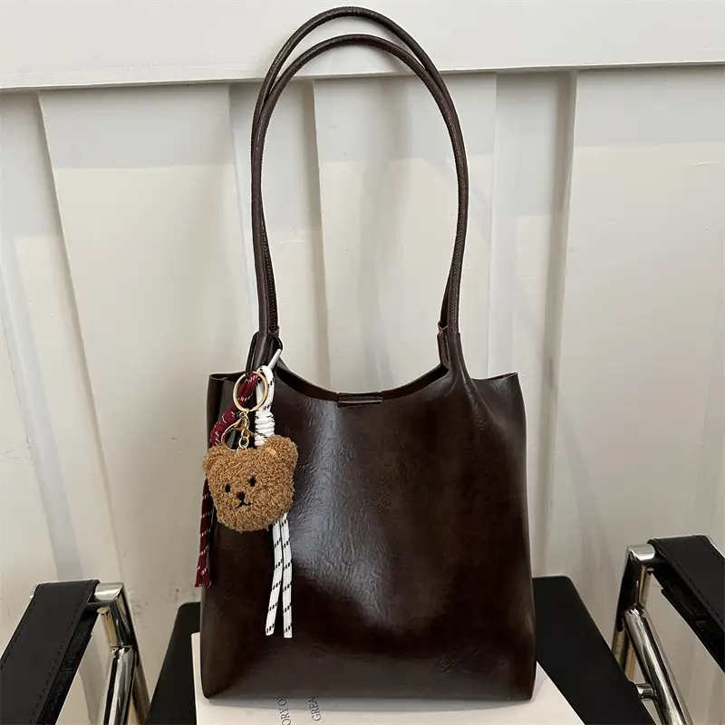 Women's Brown Leather Shoulder Bag with Teddy Bear Charm — feature 16