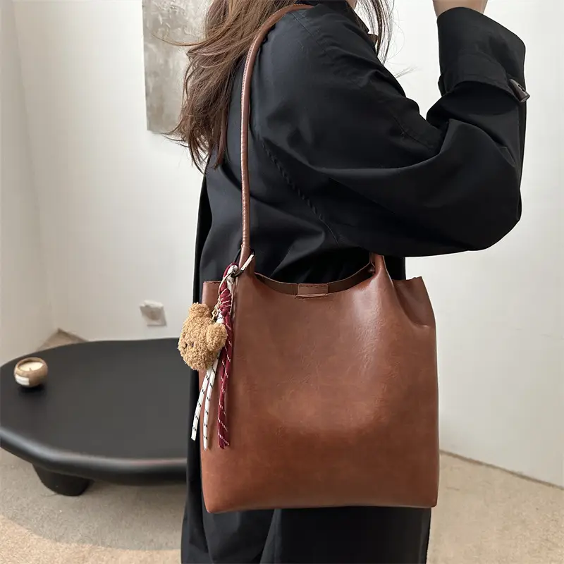 Women's Brown Leather Shoulder Bag with Teddy Bear Charm — feature 18