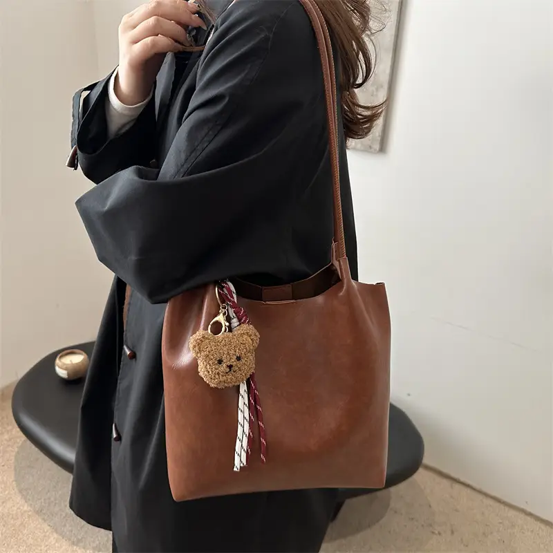 Women's Brown Leather Shoulder Bag with Teddy Bear Charm — feature 20