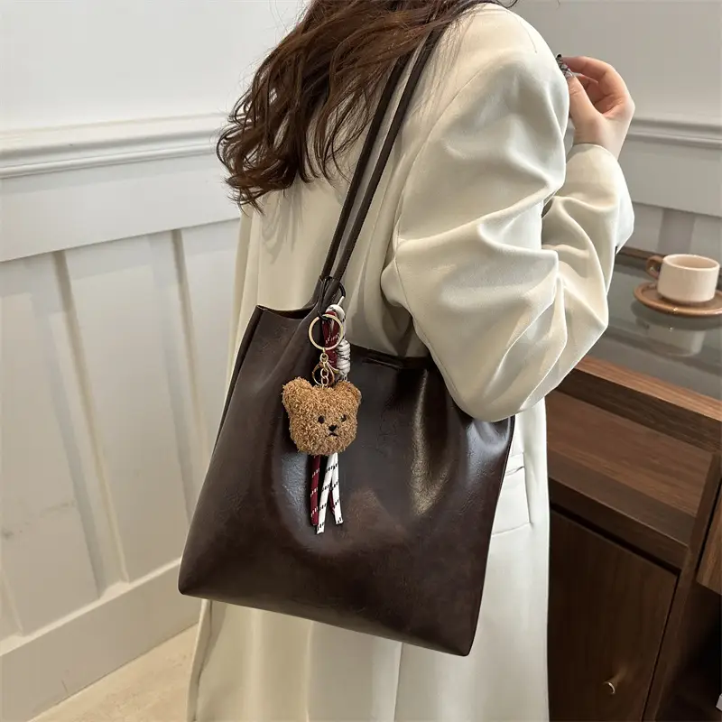 Women's Brown Leather Shoulder Bag with Teddy Bear Charm — feature 23