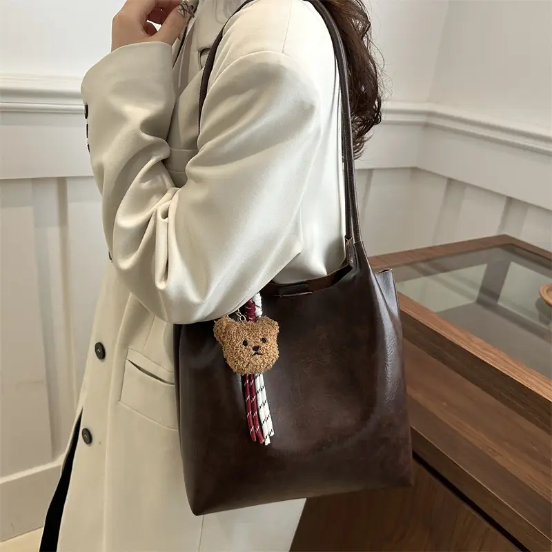 Women's Brown Leather Shoulder Bag with Teddy Bear Charm — feature 24