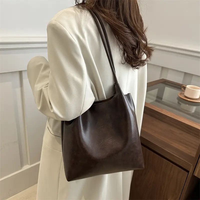 Women's Brown Leather Shoulder Bag with Teddy Bear Charm — feature 25