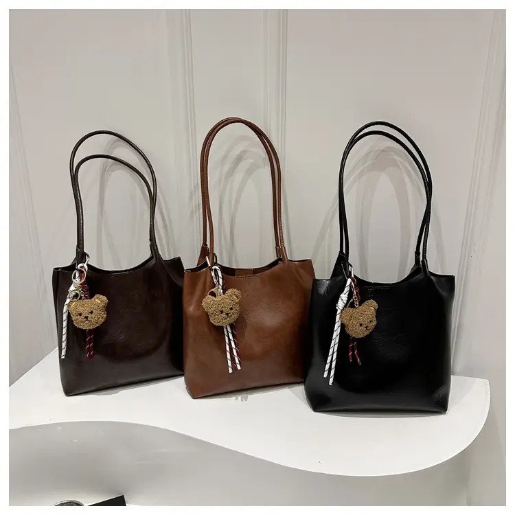 Women's Brown Leather Shoulder Bag with Teddy Bear Charm — feature 4