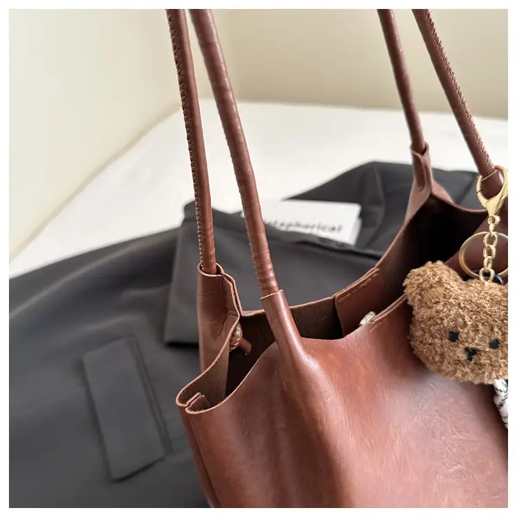 Women's Brown Leather Shoulder Bag with Teddy Bear Charm — feature 9