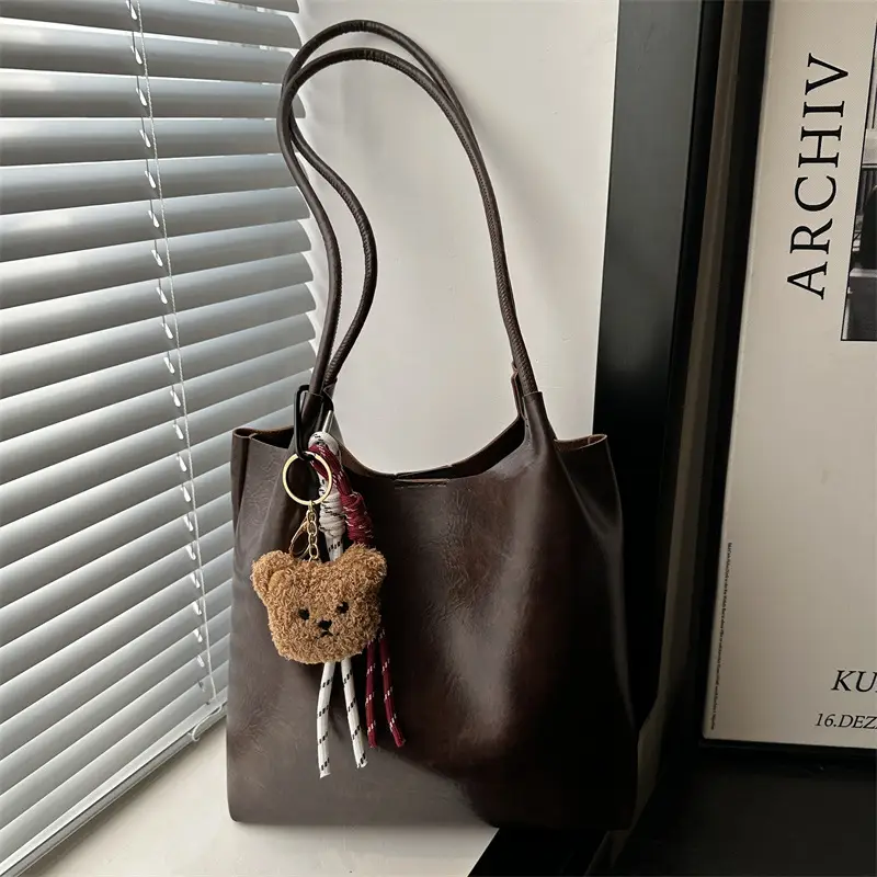 Women's Brown Leather Shoulder Bag with Teddy Bear Charm - Image 6