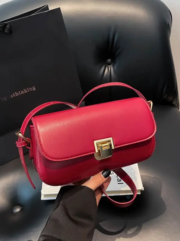 Women's Black Saddle Crossbody Bag with Gold Clasp - Image 7