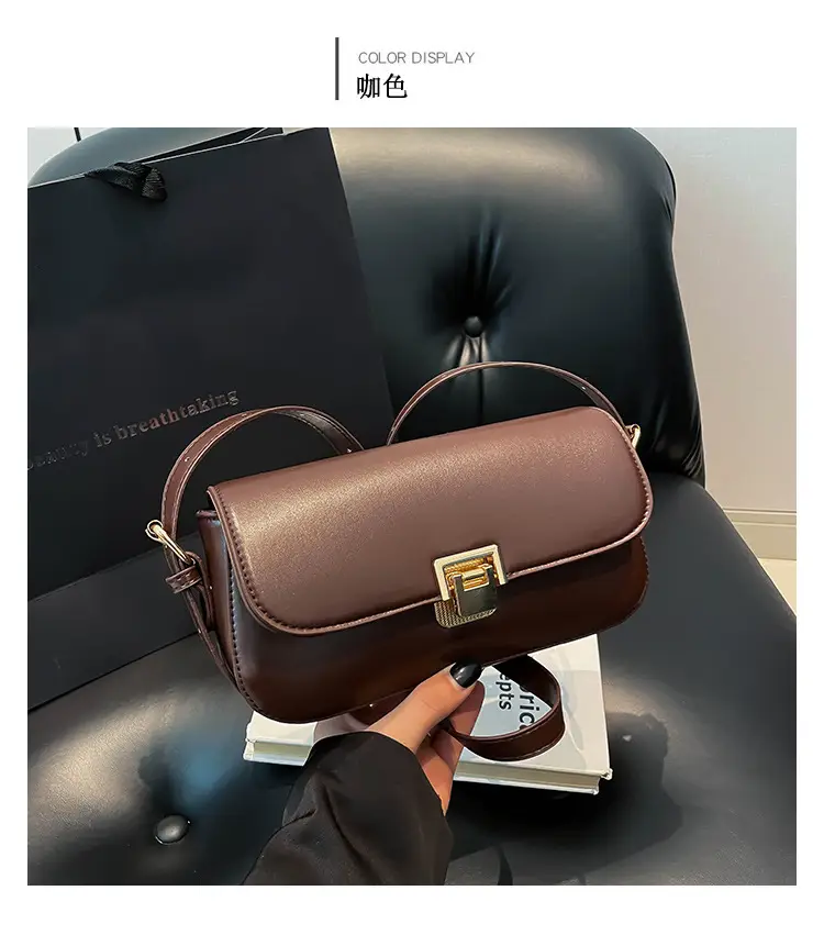 Women's Black Saddle Crossbody Bag with Gold Clasp — feature 12