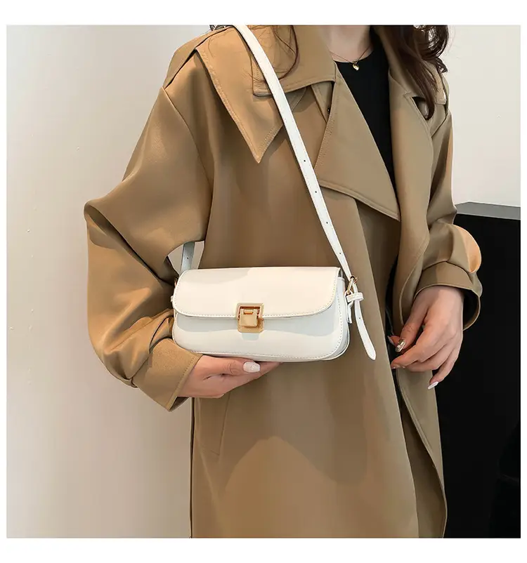 Women's Black Saddle Crossbody Bag with Gold Clasp — feature 17
