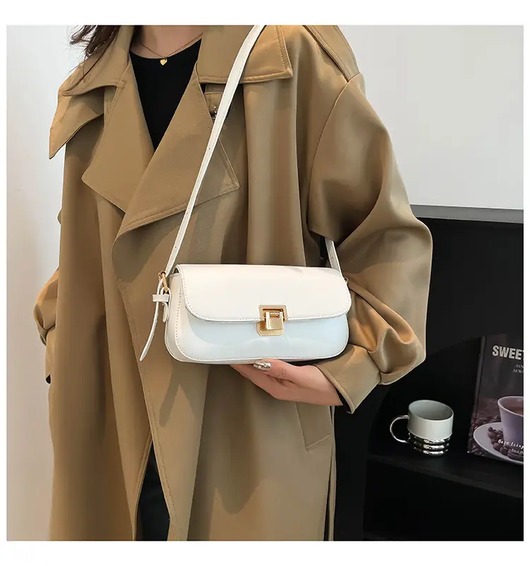 Women's Black Saddle Crossbody Bag with Gold Clasp — feature 18