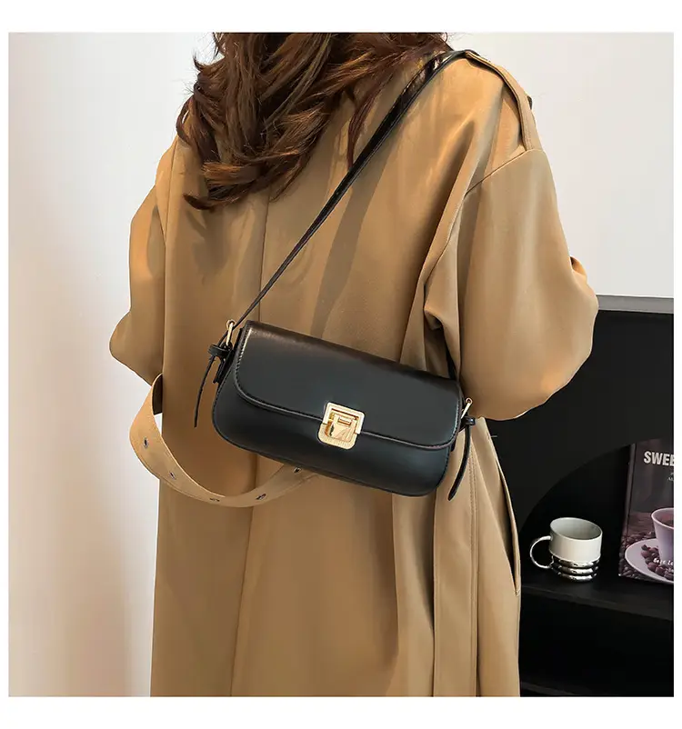 Women's Black Saddle Crossbody Bag with Gold Clasp — feature 21