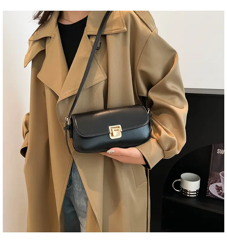 Women's Black Saddle Crossbody Bag with Gold Clasp — feature 22