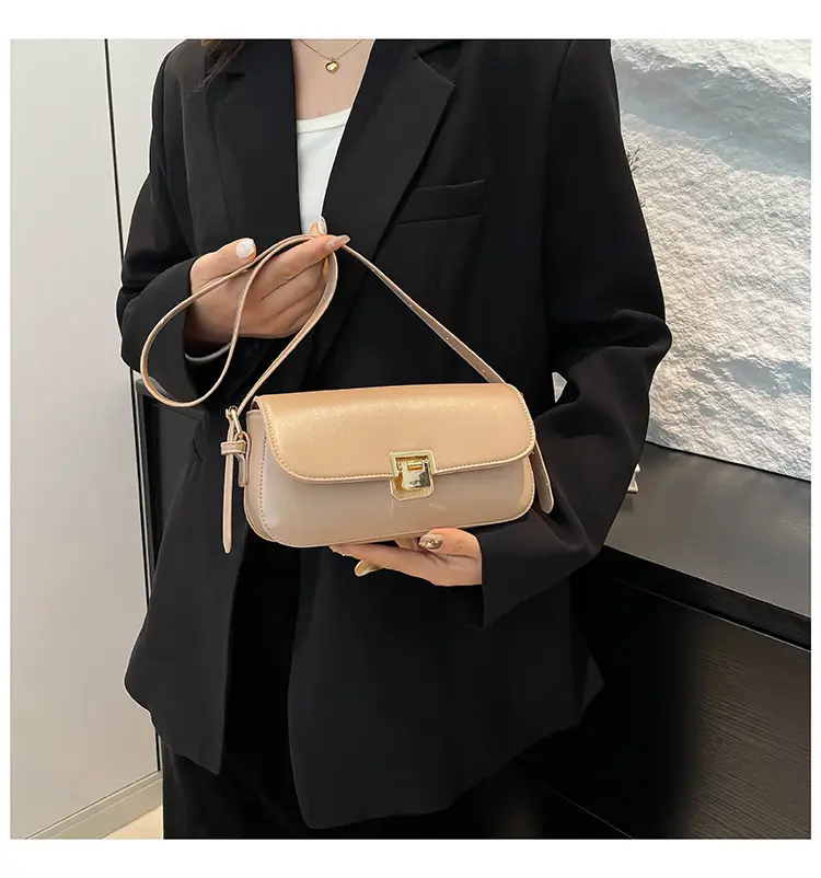 Women's Black Saddle Crossbody Bag with Gold Clasp — feature 25
