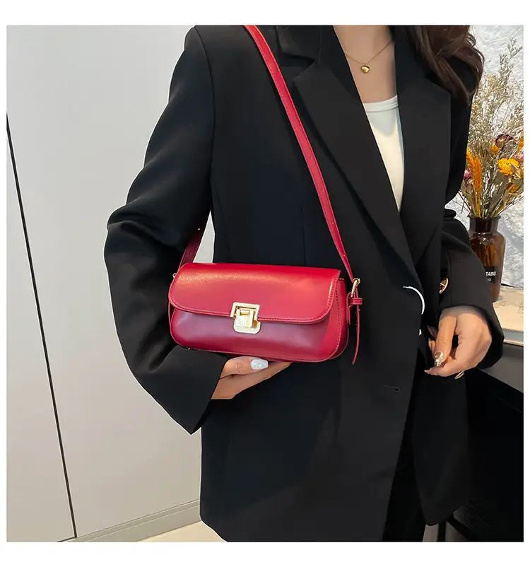 Women's Black Saddle Crossbody Bag with Gold Clasp — feature 26
