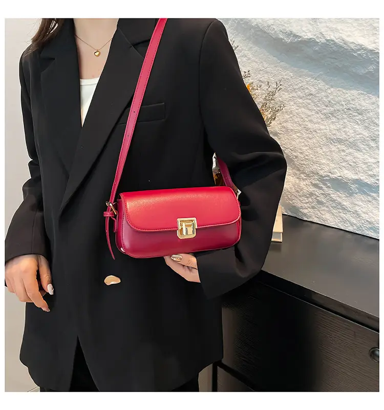 Women's Black Saddle Crossbody Bag with Gold Clasp — feature 28