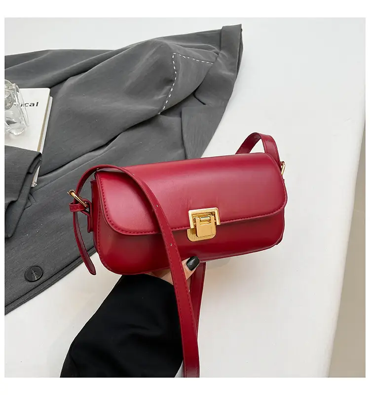 Women's Black Saddle Crossbody Bag with Gold Clasp — feature 29
