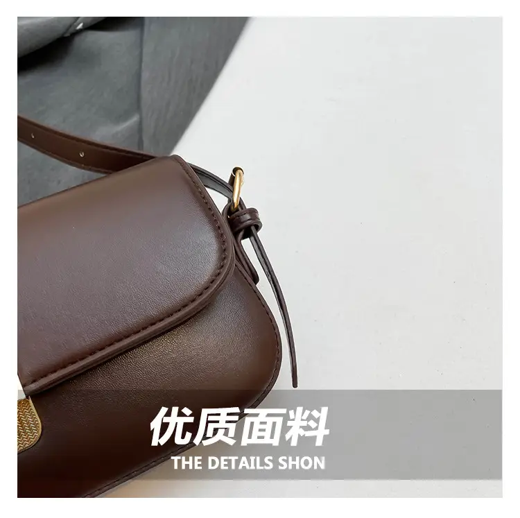 Women's Black Saddle Crossbody Bag with Gold Clasp — feature 3