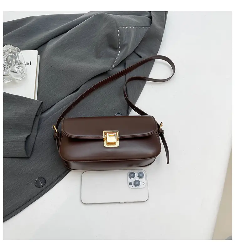 Women's Black Saddle Crossbody Bag with Gold Clasp — feature 32