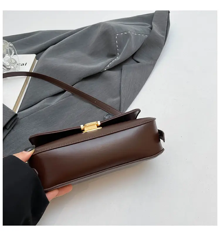 Women's Black Saddle Crossbody Bag with Gold Clasp — feature 33