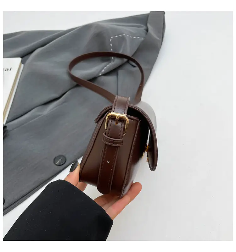 Women's Black Saddle Crossbody Bag with Gold Clasp — feature 34