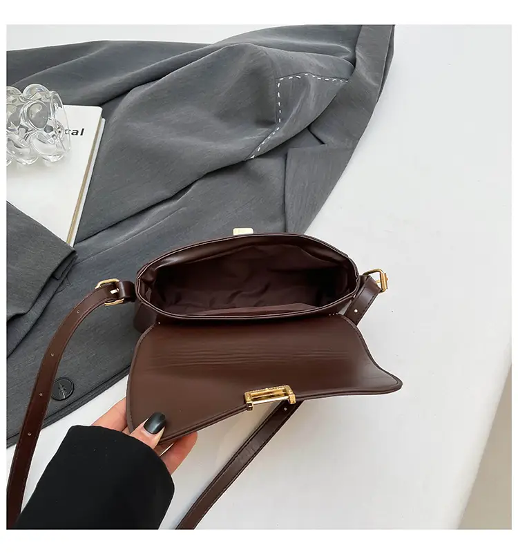 Women's Black Saddle Crossbody Bag with Gold Clasp — feature 35