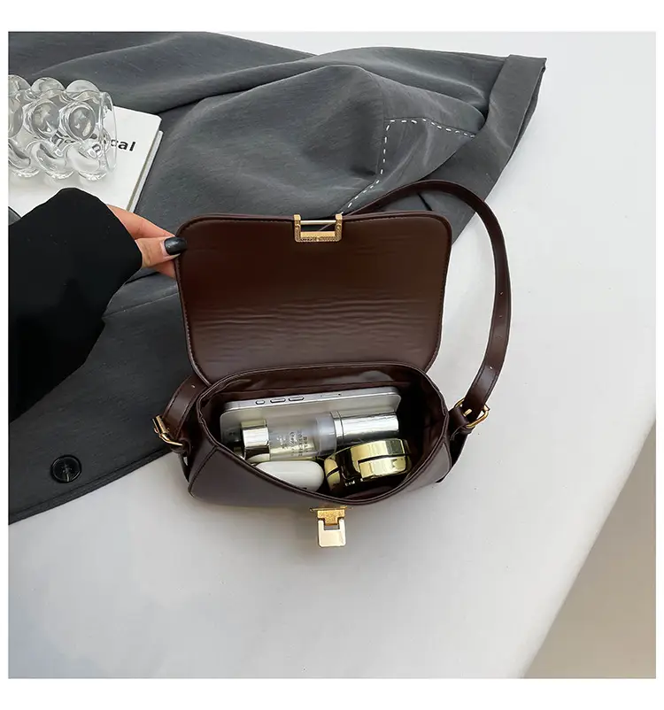 Women's Black Saddle Crossbody Bag with Gold Clasp — feature 36