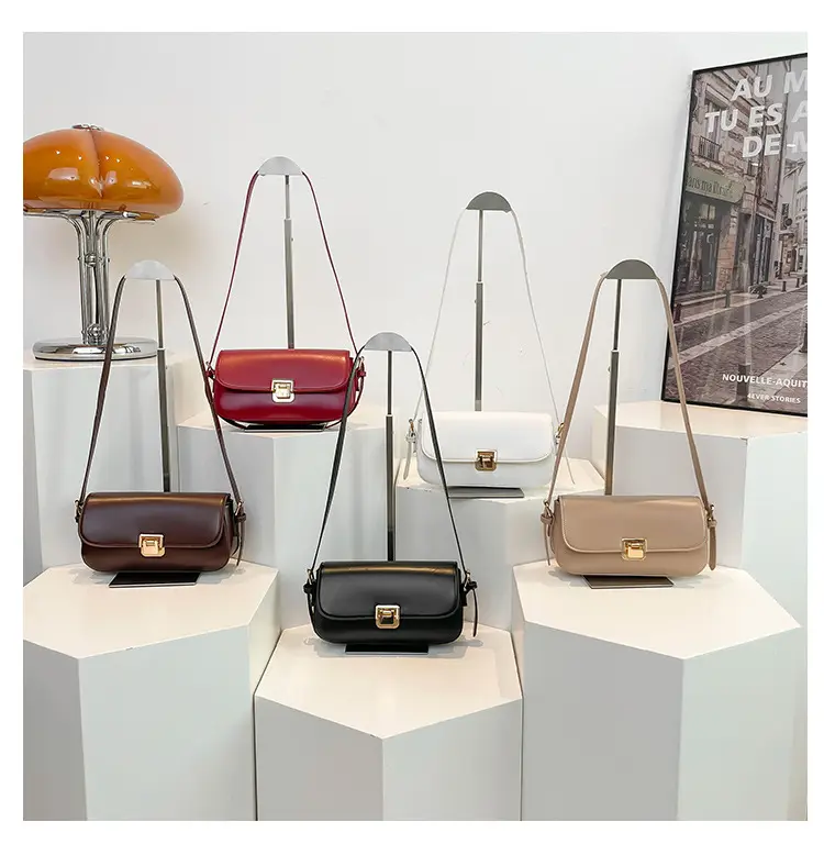 Women's Black Saddle Crossbody Bag with Gold Clasp — feature 6