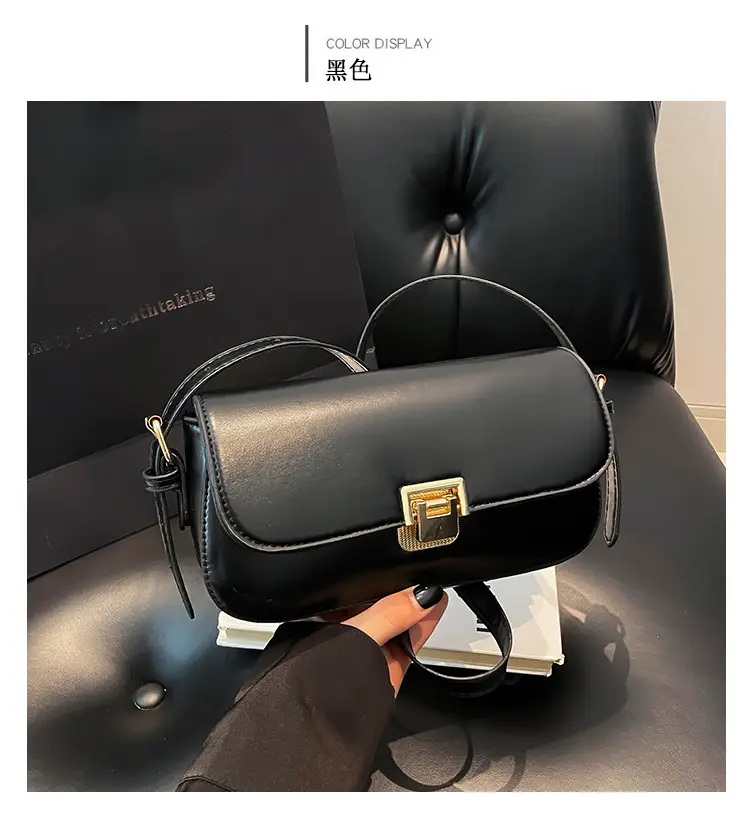 Women's Black Saddle Crossbody Bag with Gold Clasp — feature 8