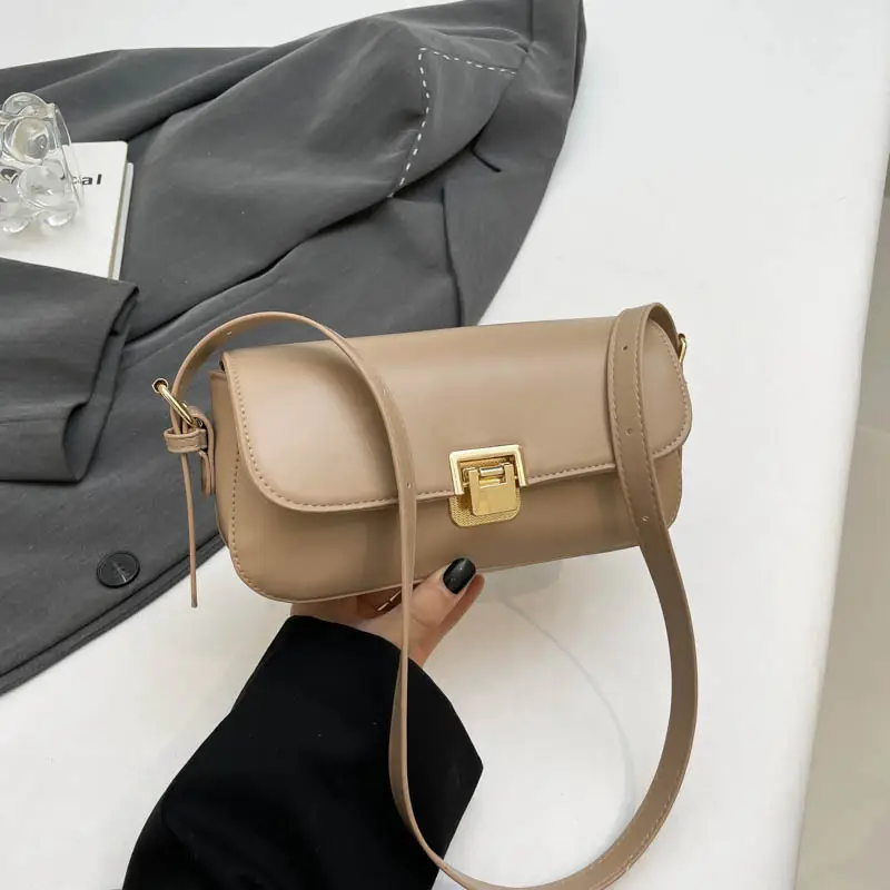 Women's Black Saddle Crossbody Bag with Gold Clasp - Image 4