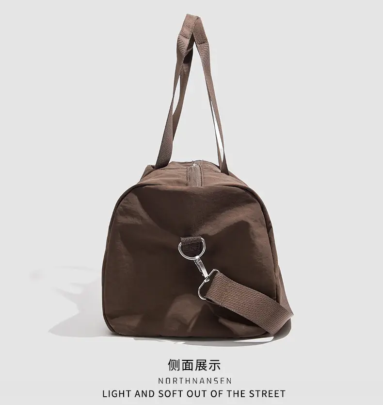 Brown Oxford Cloth Travel Bag with Crossbody Strap — feature 22