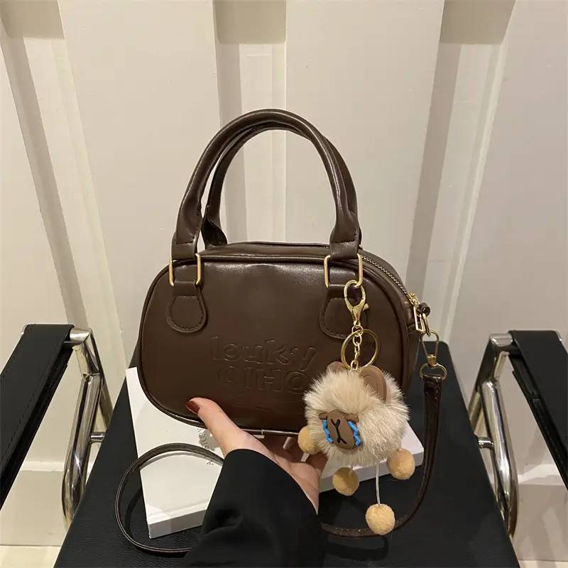 Vintage Women's Brown Shoulder Crossbody Bag with Pom Pom Charm - Image 7