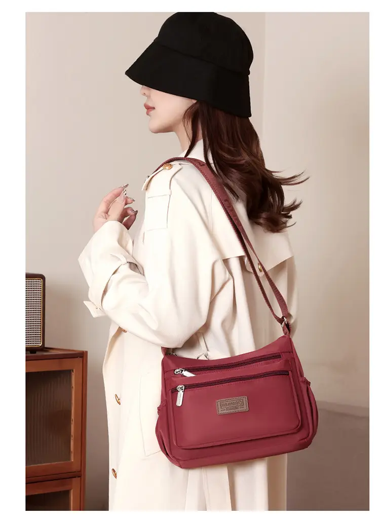 Light Blue Mu Lan Arc Crossbody Bag 2024 — feature 19
