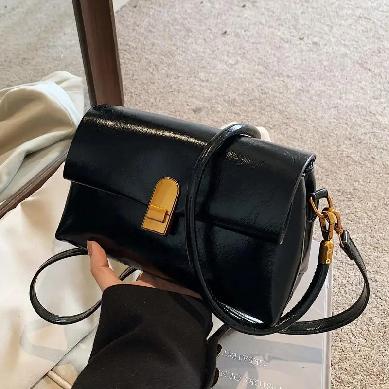 Women's Brown Leather Shoulder Bag with Gold Clasp
