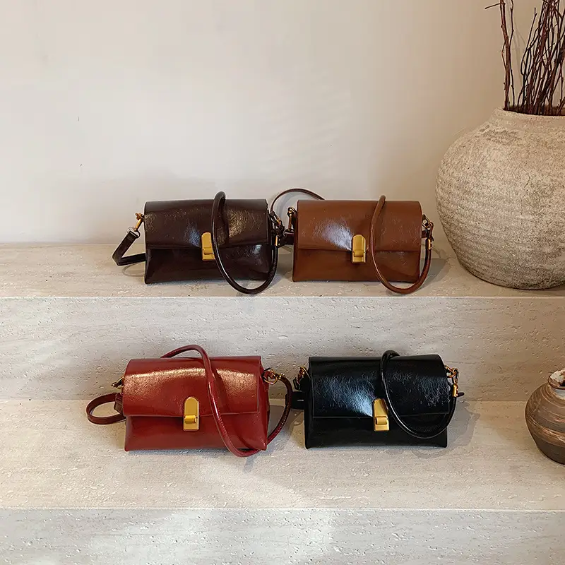 Women's Brown Leather Shoulder Bag with Gold Clasp