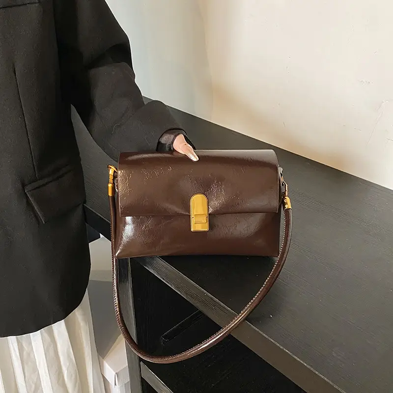 Women's Brown Leather Shoulder Bag with Gold Clasp