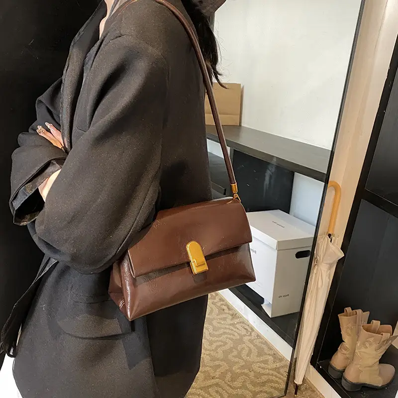 Women's Brown Leather Shoulder Bag with Gold Clasp