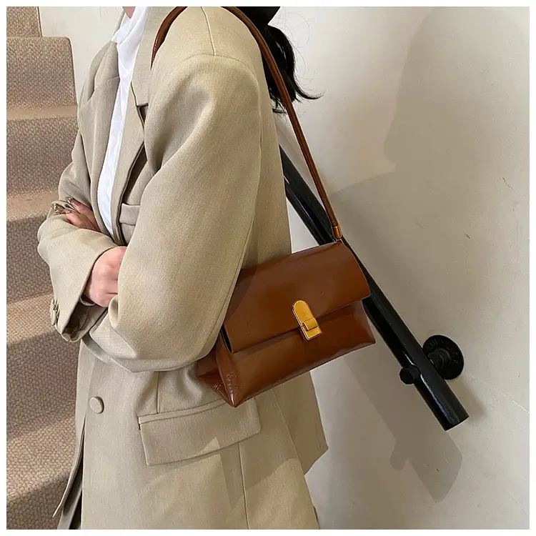 Women's Brown Leather Shoulder Bag with Gold Clasp — feature 16
