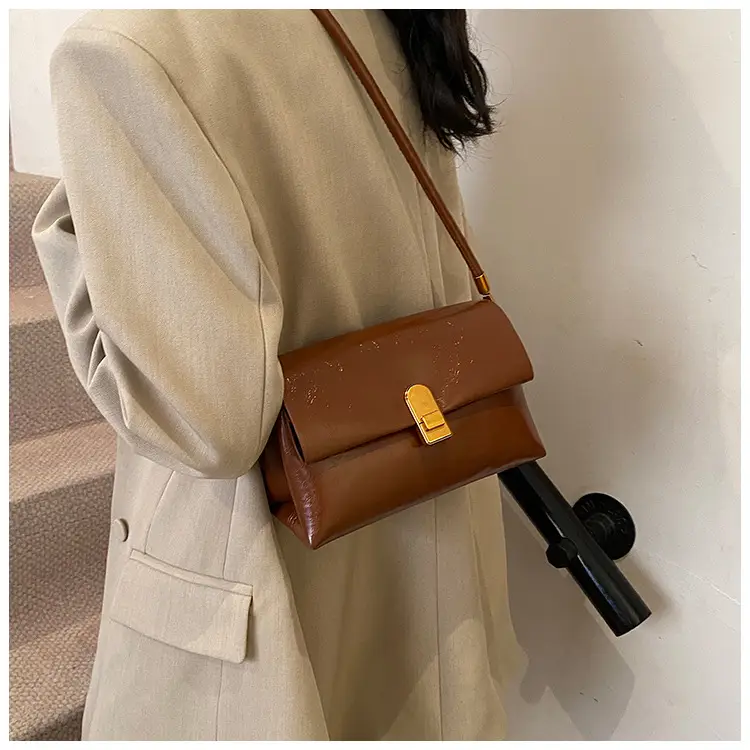 Women's Brown Leather Shoulder Bag with Gold Clasp — feature 17