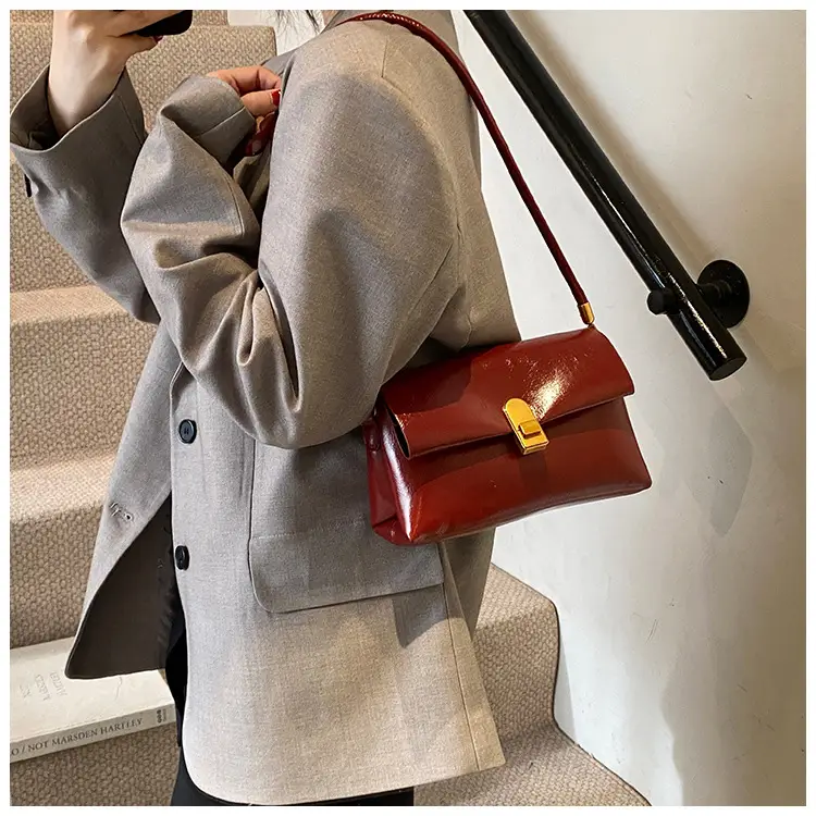 Women's Brown Leather Shoulder Bag with Gold Clasp — feature 21